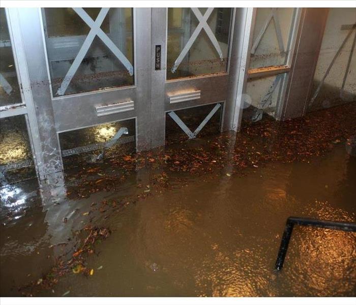 Flooded building entrance, caused by Hurricane Sandy, seen on October 29, 2012, in the corner of Bragg street and Shore Pway 
